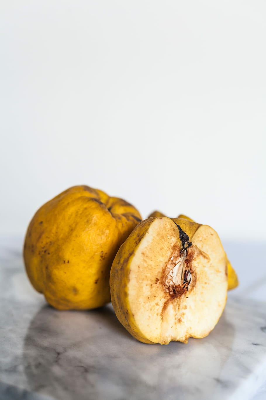 yellow fruit, two round yellow fruits, apple, old, wrinkled, food and drink HD wallpaper