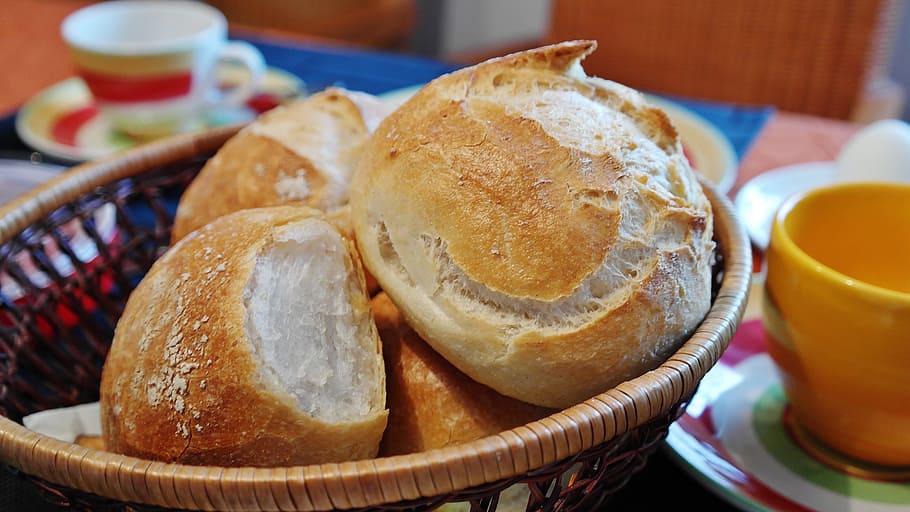 baked bread on wooden basket near yellow cup, roll, cakes, weizenbroetchen HD wallpaper
