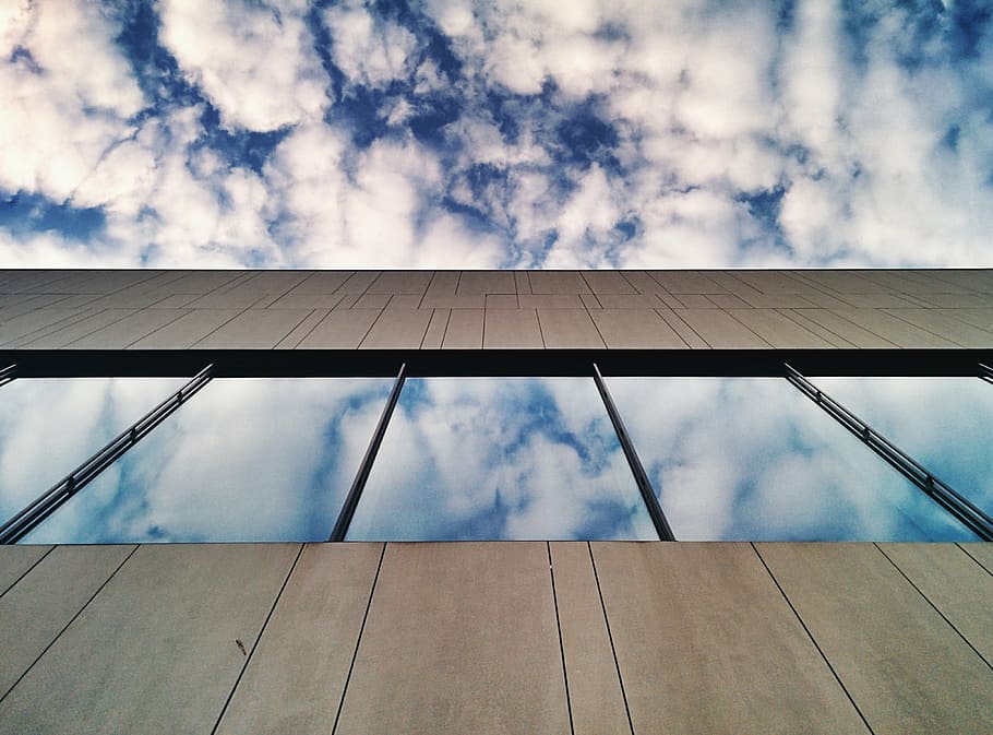 low-angle photography of wall and white clouds, building, window HD wallpaper