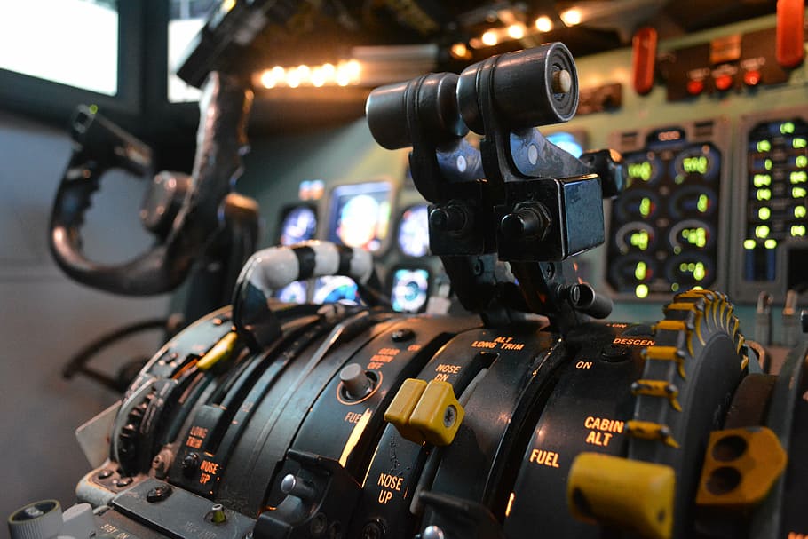selective focus photo of aircraft cockpit, simulator, aviation