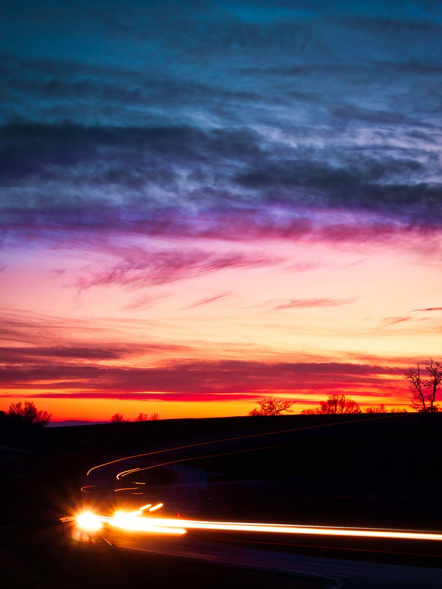 time lapse road shot, time lapse photography of vehicle on road during golden hour HD wallpaper