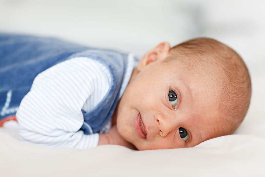 baby in blue overalls laying on white cushion, adorable, boy HD wallpaper