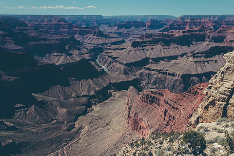 aerial view of mountain under the blue sky, scenery of a canyon HD wallpaper