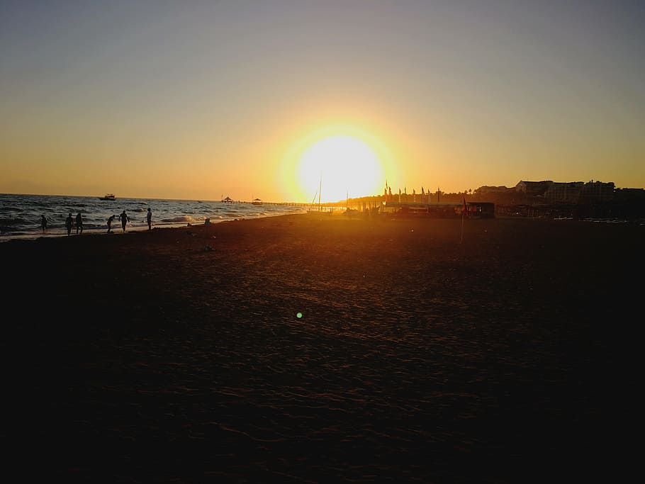 sunset, sea, beach, sky, water, sunlight, scenics - nature HD wallpaper