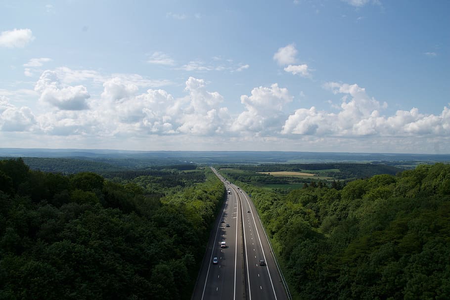 way, lane, posts, lights, trees, clouds, sky, vehicle, cars HD wallpaper