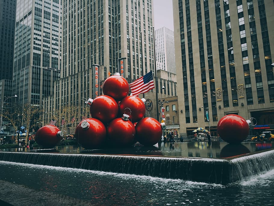 red bauble fountain near buildings, red bauble on body of water near high-rise buildings HD wallpaper