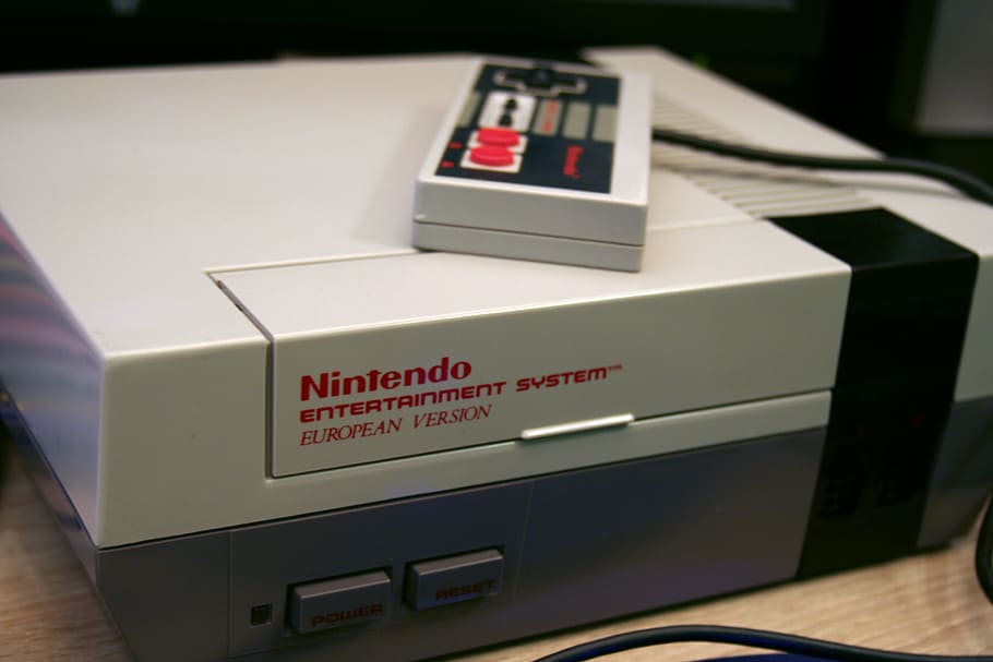 Nintendo NES console on top of brown wooden table, nintendo entertainment system, HD wallpaper