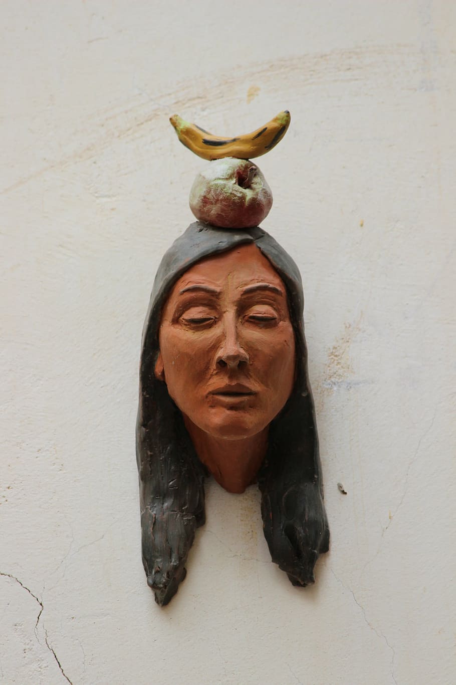 indians, head, bust, clay figure, ceramic, banana, apple, fruit