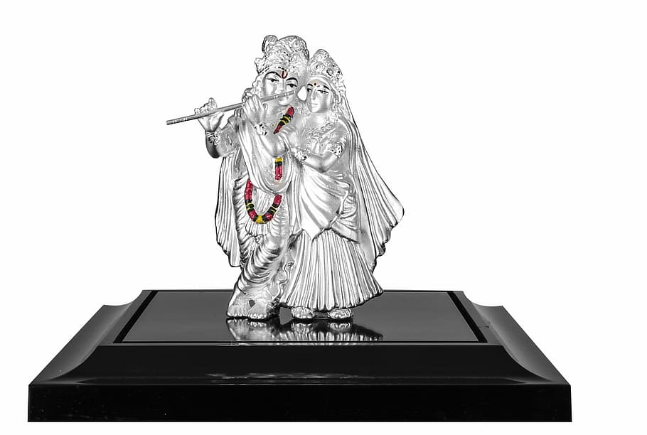 silver figure of man and woman table decors, radha, krishna, god