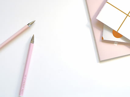 two pen near book, two pink pens on white surface, desk, paper HD wallpaper