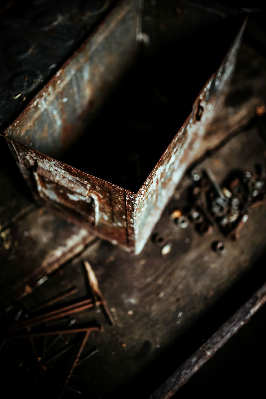 Old boxes in a workshop, nails, wooden, metal, garage, rusty