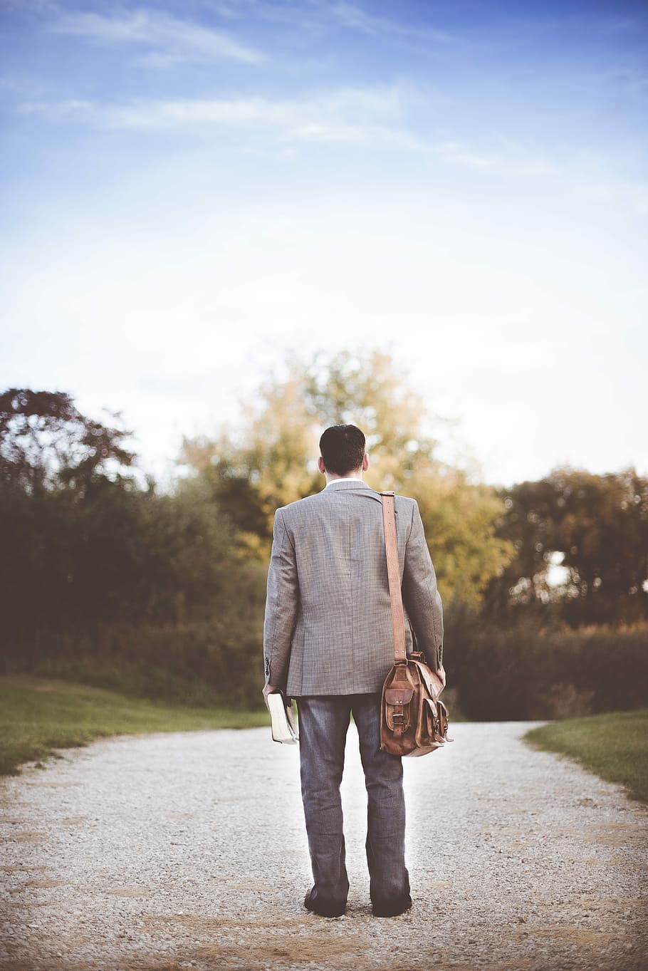 man wearing gray coat standing near road during daytime, man in gray suit jacket and blue jeans walking in street during daytime HD wallpaper