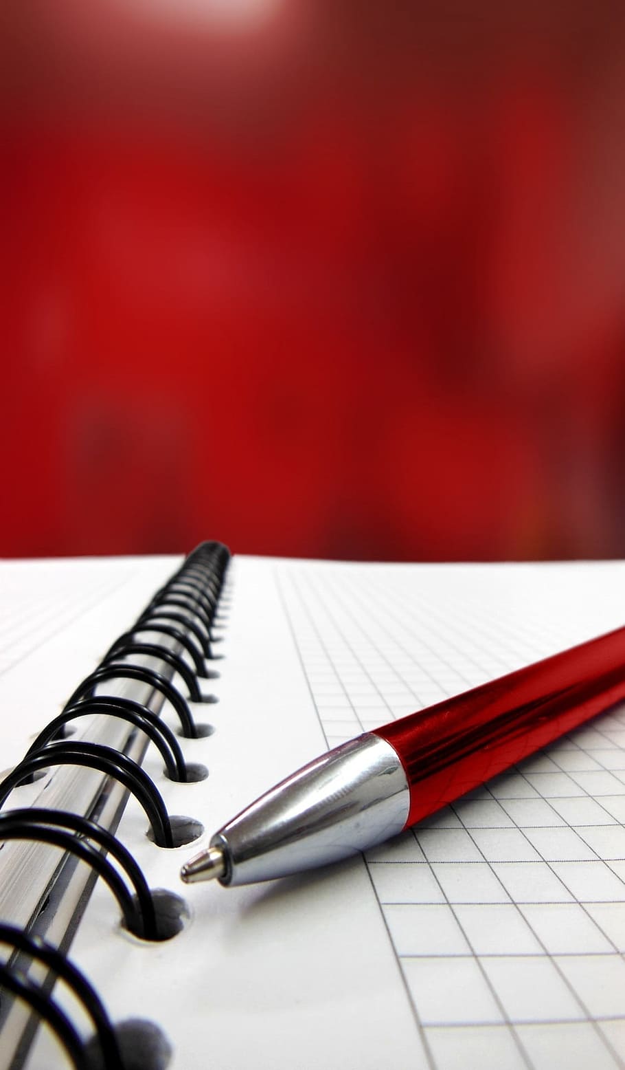 close up photography of red pen on top of spiral notebook, writing HD wallpaper