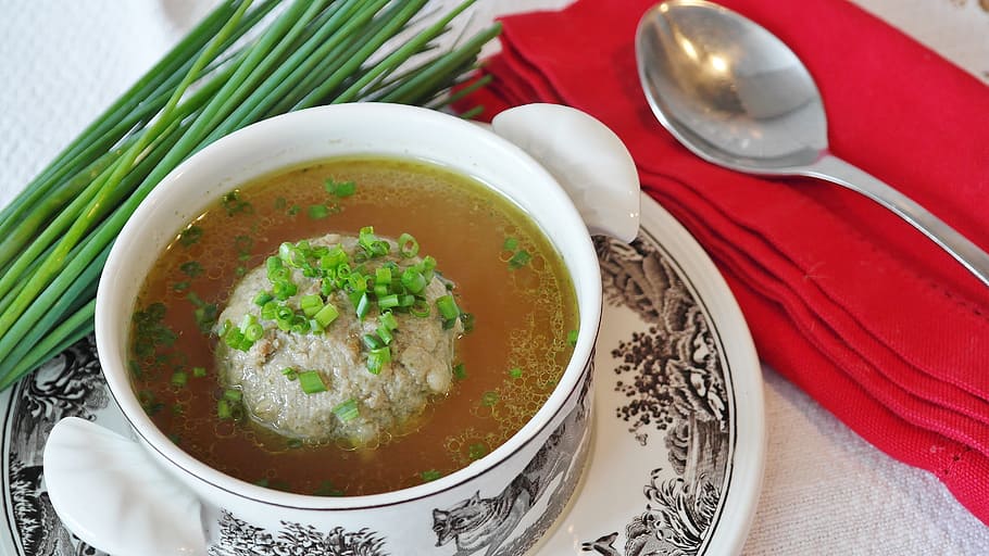 food photography of vegetable stew, soup, liver dumplings, liver dumpling soup