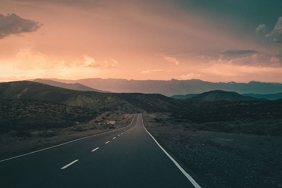 empty road pavement near the mountain photography, concrete road between mountains HD wallpaper