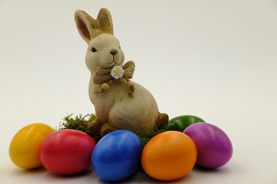 HD wallpaper: brown rabbit with eggs figurine, easter, easter bunny, easter eggs 1440...