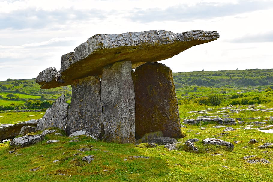 photo of balance boulders on green grass, Tomb, Portal, Dolmen