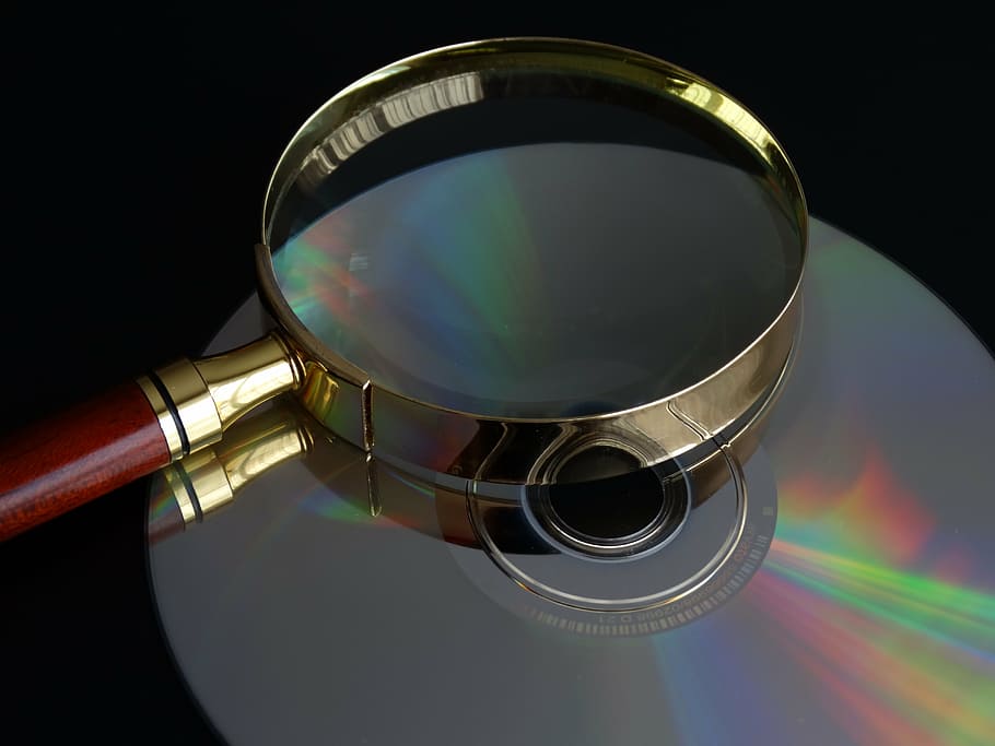 round silver magnifying glass on gray CD, data search, to find HD wallpaper