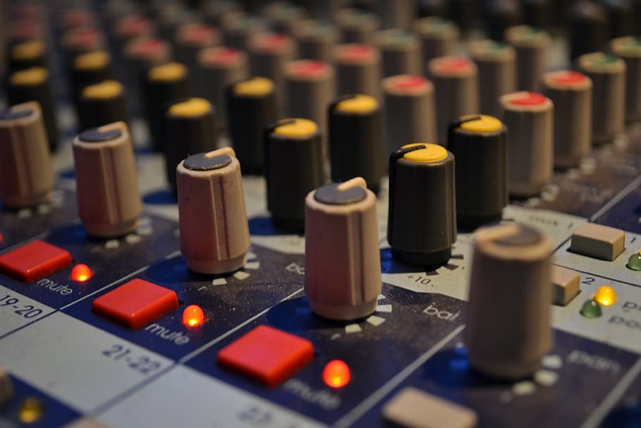 bokeh photo of studio mixer, audio, mixing board, music studio