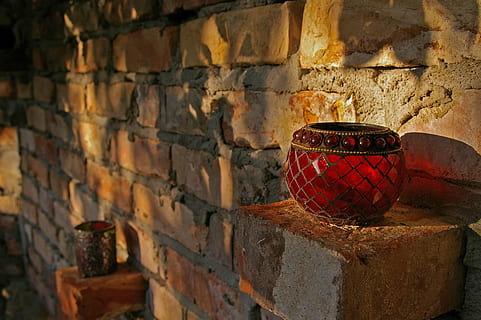 two red pomegranate glass vases placed on beige bricks, windlight HD wallpaper