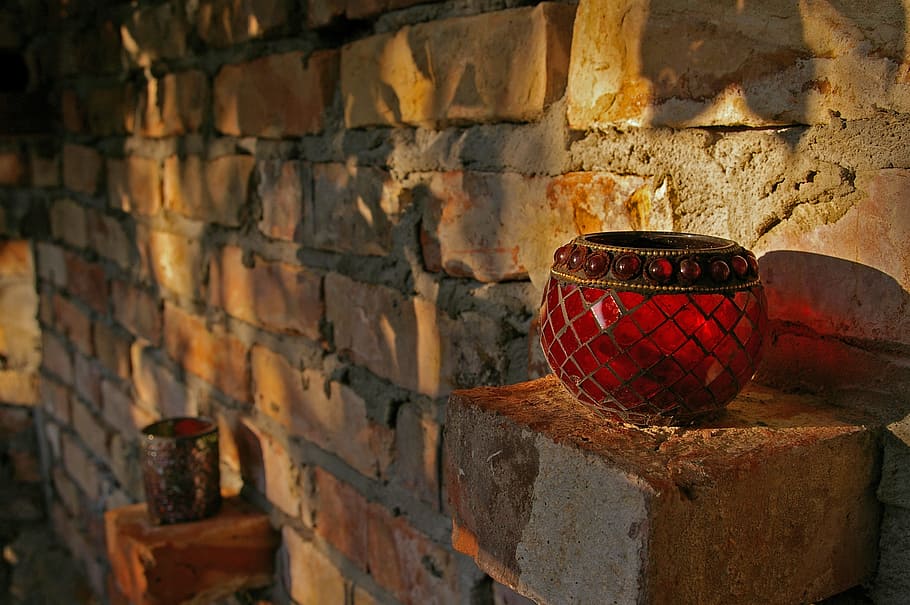 two red pomegranate glass vases placed on beige bricks, windlight HD wallpaper