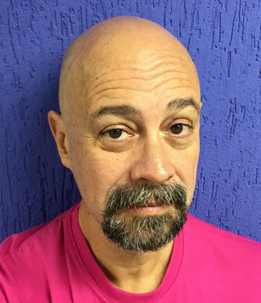 man in pink shirt taking selfie, bald, middle aged, goatee HD wallpaper