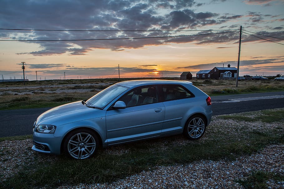 An Audi A3 S-Line sits at sunset on the Kent Coast in the South of England. HD wallpaper