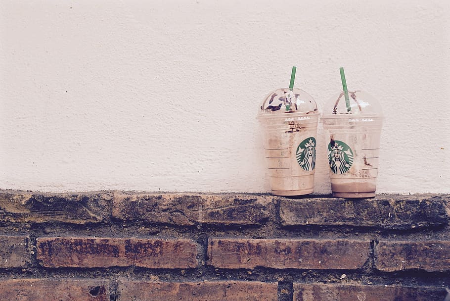 two empty Starbucks disposable cups on wall, near, photo, plastic HD wallpaper