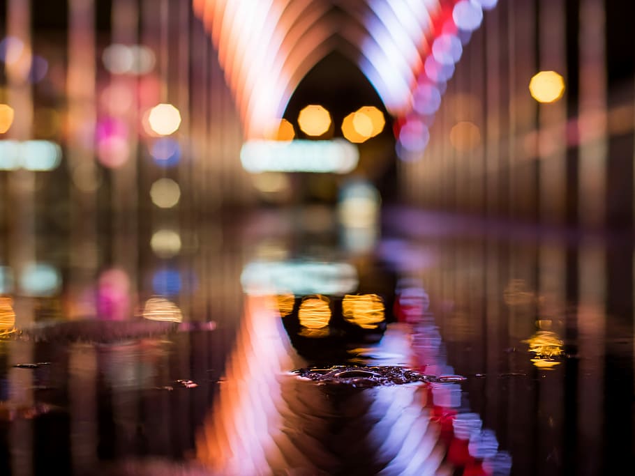 bokeh photography of water drop, wet floor shallow focus photography HD wallpaper