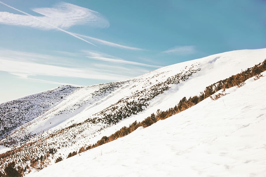 landscape photography of snowy mountain, mountain peak under blue sky during day time HD wallpaper