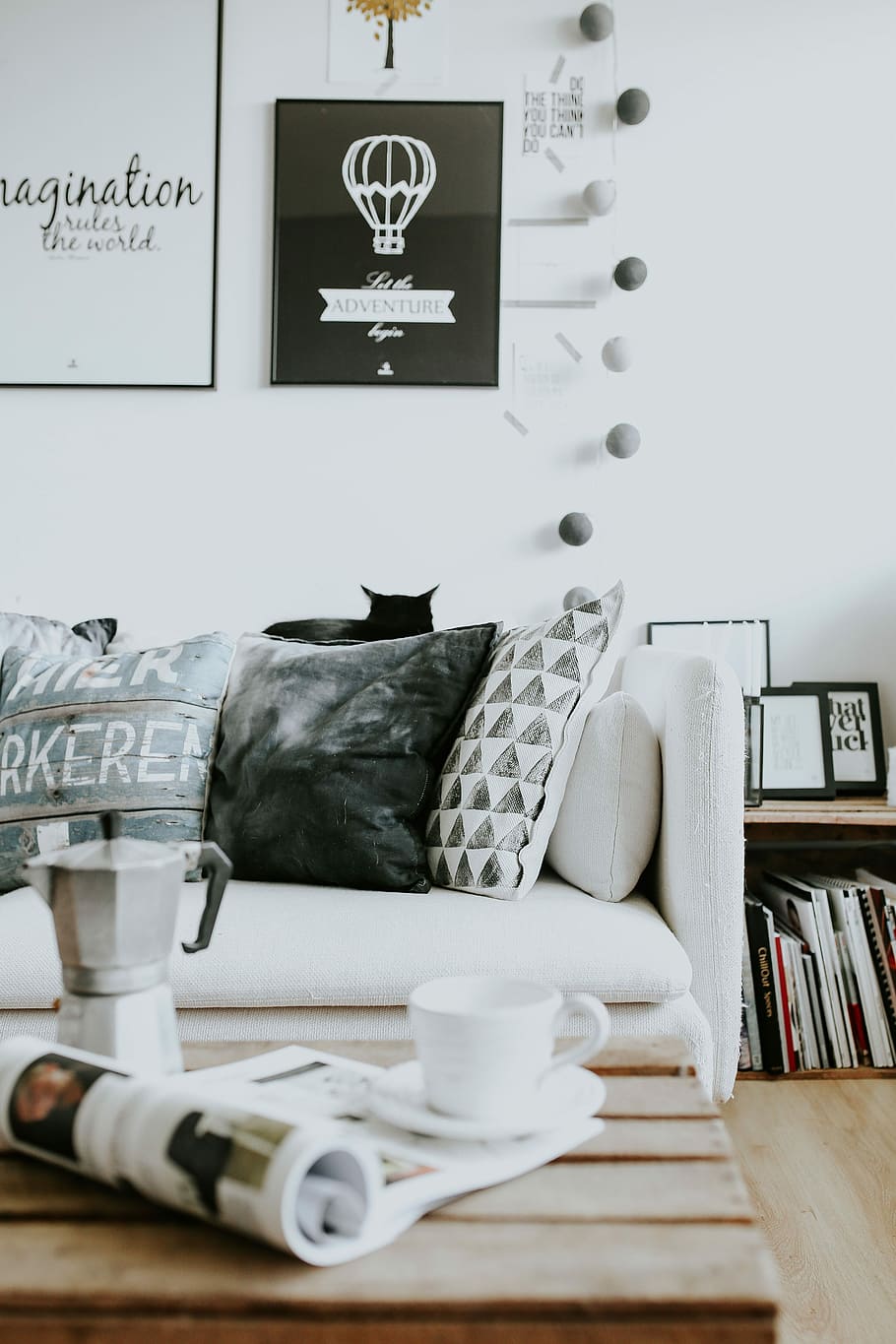 Contemporary black-and-white home decor, interior, sofa, magazines