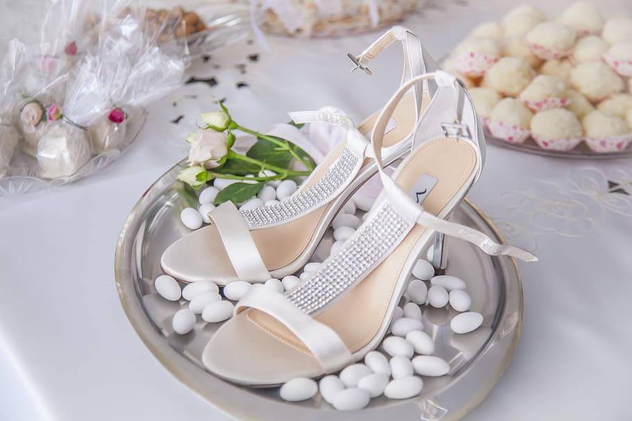 pair of white strap sandals on gray tray, shoe, bride, sugared almonds HD wallpaper