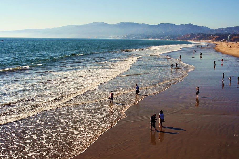 people at beach, seascape, ocean, sand, shore, hills, waves HD wallpaper