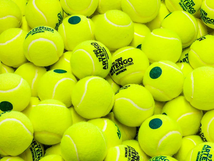 yellow Artengo tennis ball lot, sports, game, large group of objects