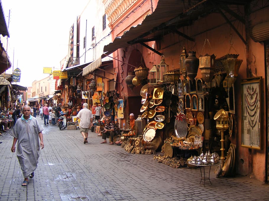 people on market street at daytime, marrakesh, lamps, souk, medina
