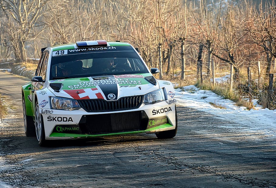 white and green Skoda rally car on road near tress, race, sport, HD wallpaper