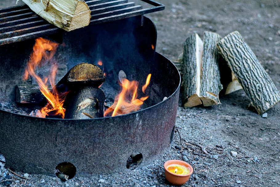 burning firewoods on grille, closeup photography of brown dome fire pit HD wallpaper