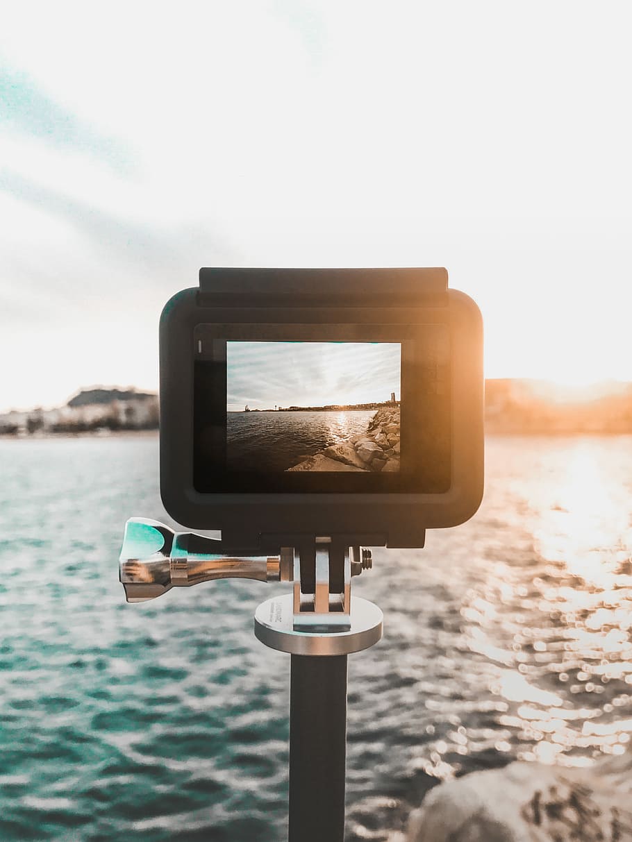 black action camera capturing ocean waves, gopro, tripod, sea HD wallpaper