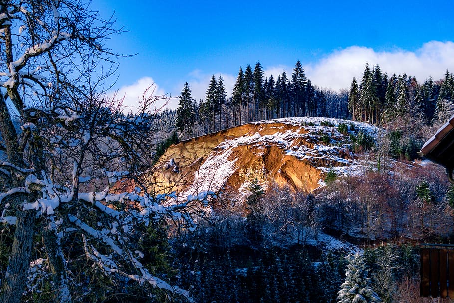landscape photography of mountains surrounded by trees, rock formation near trees HD wallpaper
