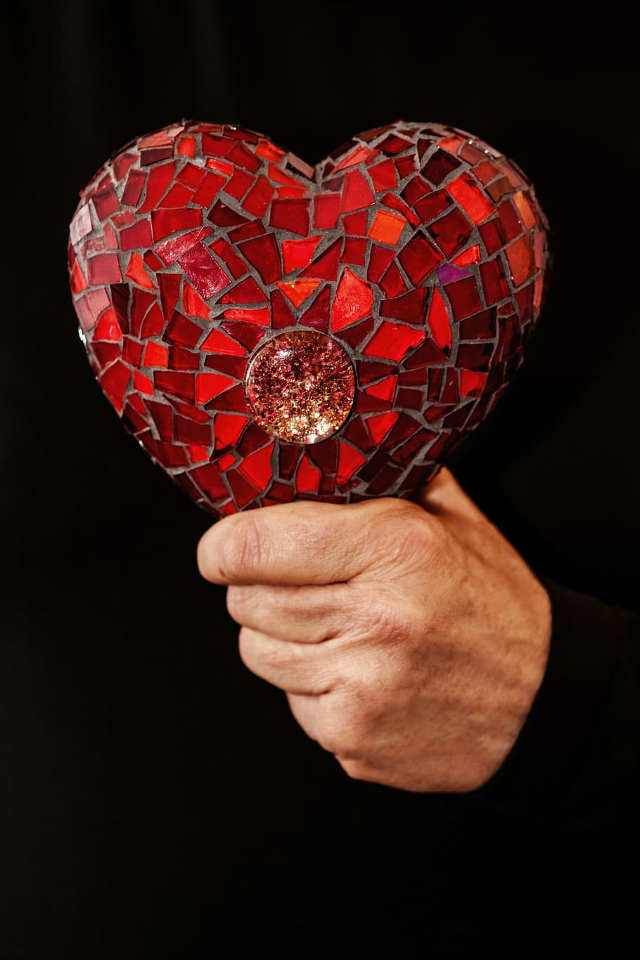 person holding red heart decor, love, broken heart, valentine's day