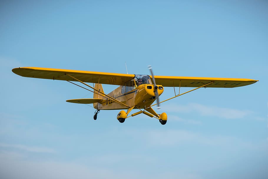 HD wallpaper: person riding in plane, piper cub, aircraft, propeller, yellow  | Wallpaper Flare