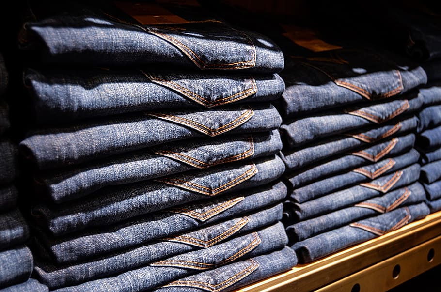 HD wallpaper: blue denim bottoms on brown wooden rack, jeans, pants ...