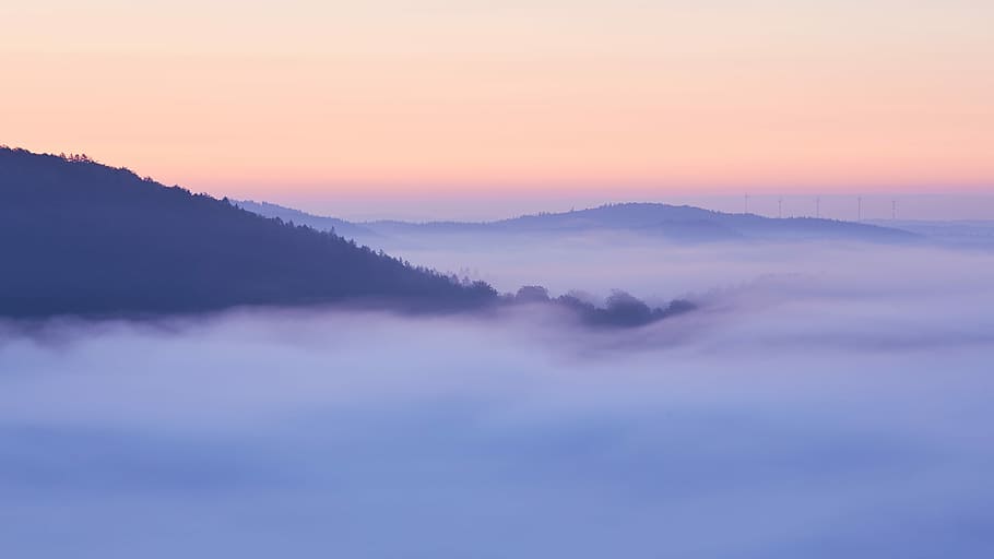 aerial view of mountain covered with clouds, foggy mountain during daytime HD wallpaper