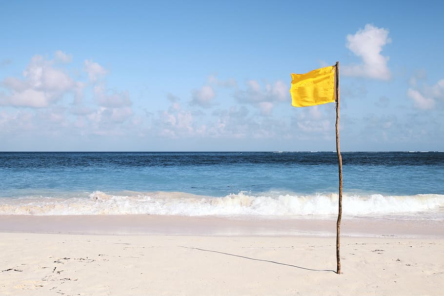yellow flag in seashore photography, beach, coast, waves, water HD wallpaper