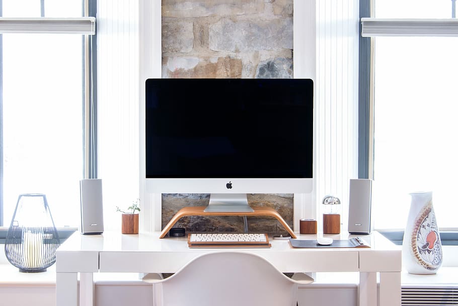 white iMac on top white desk, silver iMac turned off on white wooden table, HD wallpaper