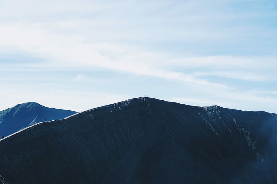 landscape photo of mountain during daytime, rock mountain under blue sky HD wallpaper