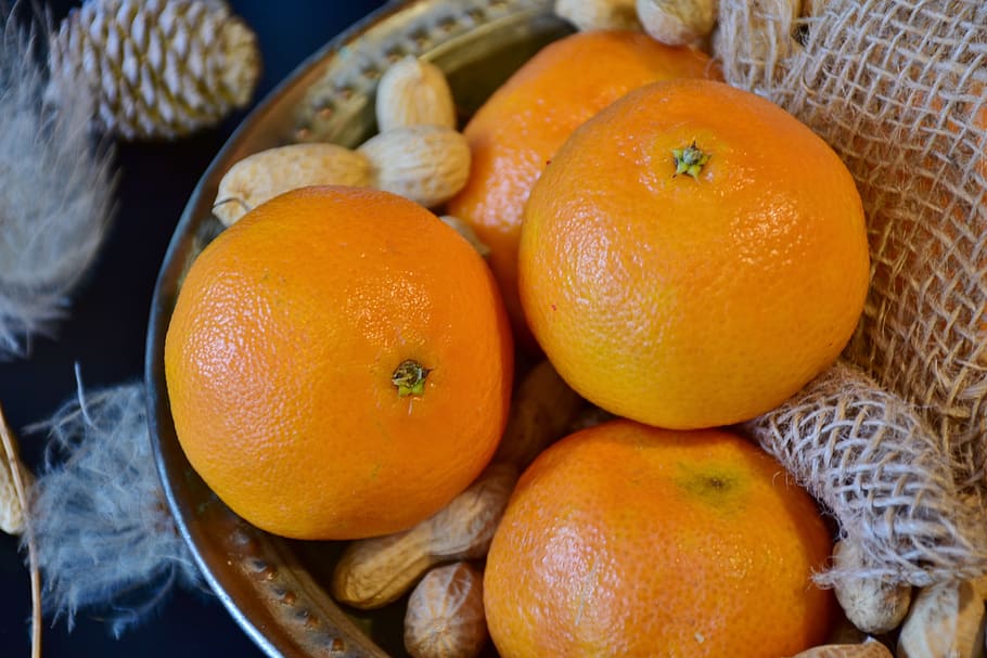 four orange fruits and nuts in bowl, tangerines, peanuts, christmas HD wallpaper