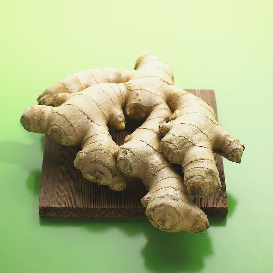 brown ginger on brown chopping board, ginger root, vegetables