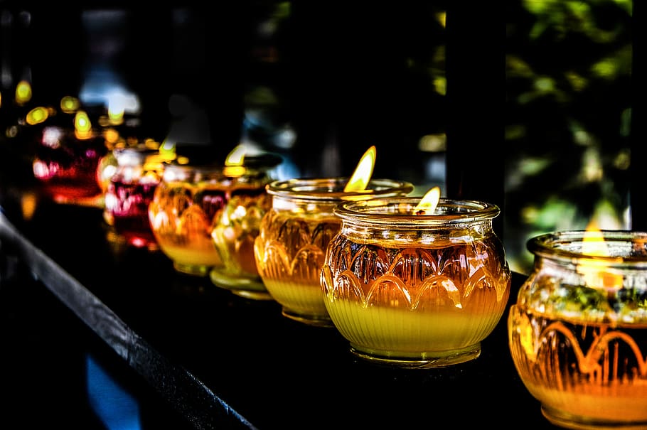 orange glass candle holders with lighted candles, candles in glass candle holders HD wallpaper