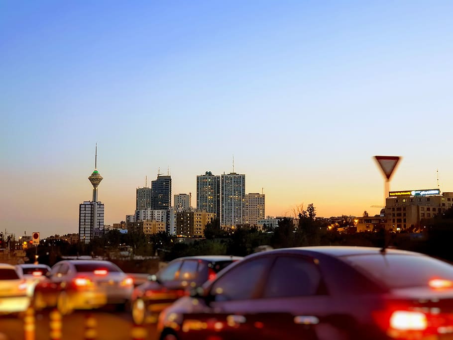 Shahrake Gharb, Tehran, Iran, cars on road near high rise building during blue hour, HD wallpaper